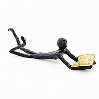 Decor Figure laying down reading image