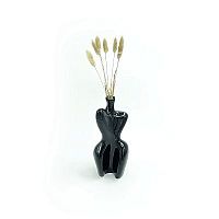Decor dried grasses in black body vase image